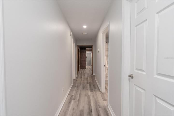 Hallway towards 3 bedrooms and Flex Space