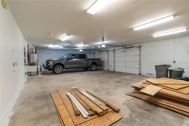 Oversized Garage with Side Bay for Workshop or Storage