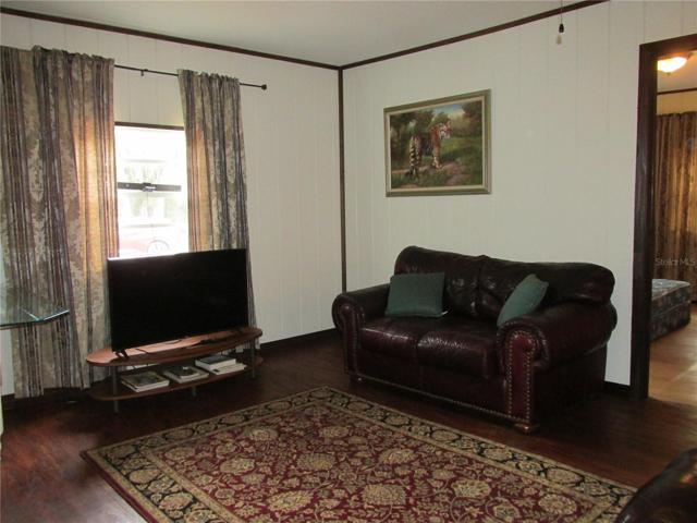 Leather sofa does not convey.