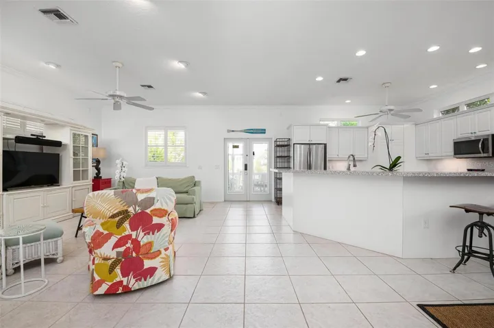 Open concept with doors to the covered patio