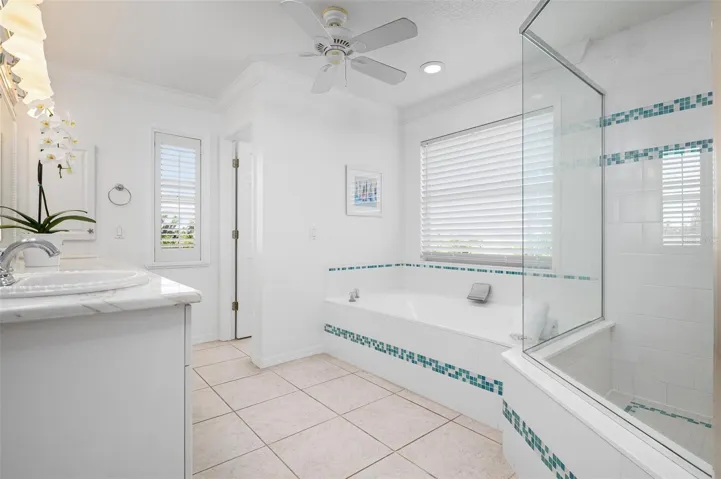 Primary bathroom with walk in shower and soaking tub