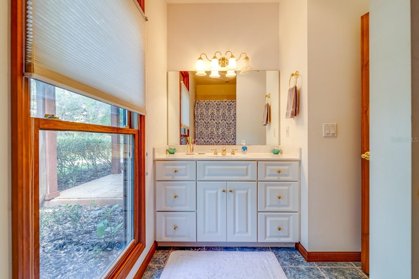 Guest House Bathroom #1 with a Tub