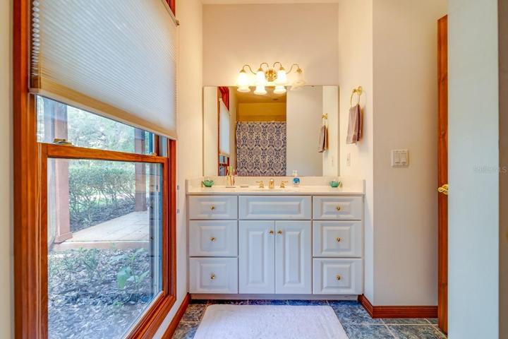 Guest House Bathroom #1 with a Tub