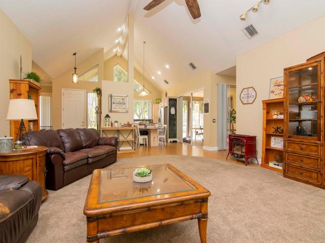 Family room with view to kitchen and hallway