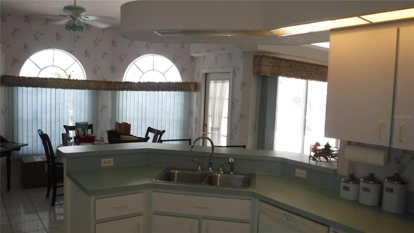 Kitchen View of Pool and Breakfast Nook