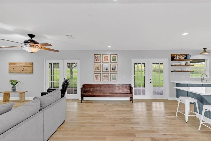 French doors open to the patio and spacious backyard.