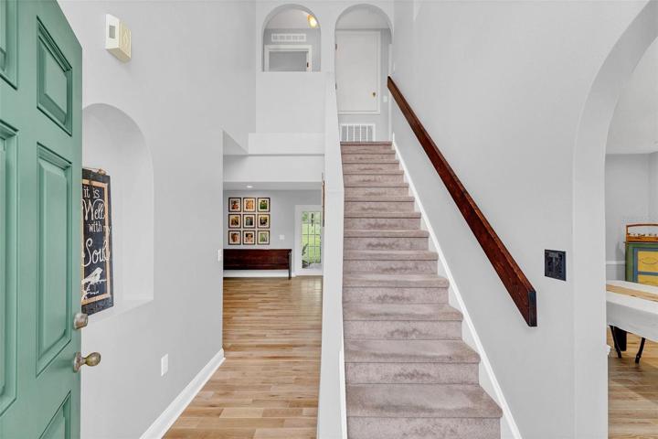 Foyer -  notice the gorgeous hardwood floors throughout the entire downstairs..