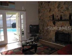 Fireplace and view to pool
