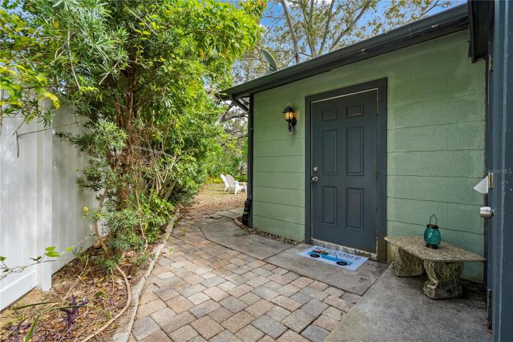 Rear Patio w/ Entrance to 2nd Guest Bedroom