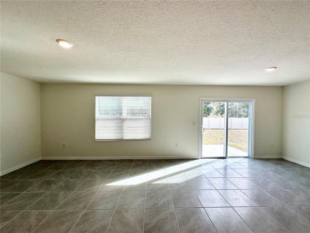 Living room and dine-in kitchen
