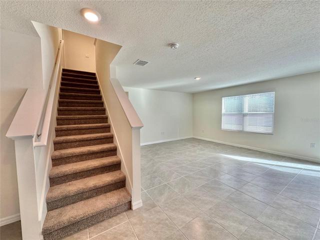 Staircase and living room
