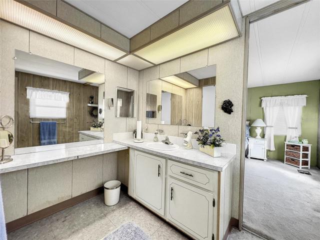 On suite bathroom with walk in closet