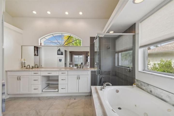 Gorgeous master bathroom complete with a soaking tub and walk-in shower
