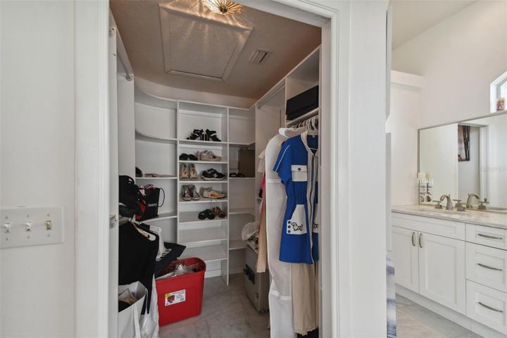Master Bedroom Walk-in Closet with Built-Ins