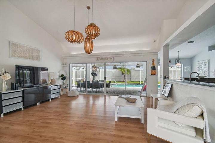 Open floor plan and beautiful light fixtures