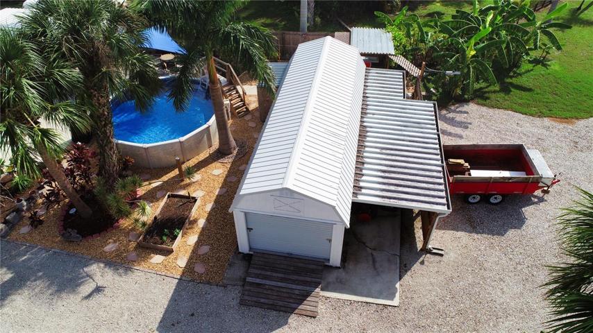 12x30 shed/garage with covered storage area