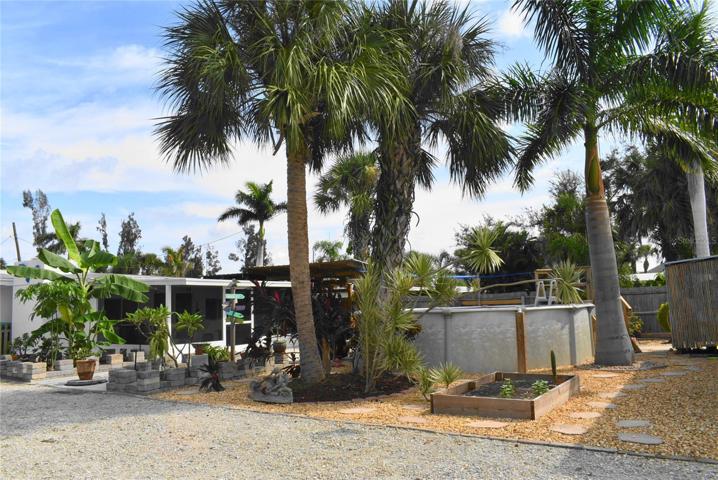 Backyard with garden area and pool