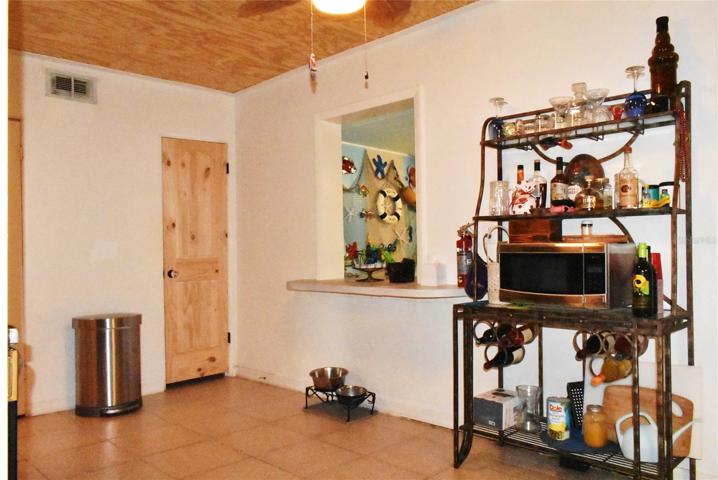 Kitchen with pass through to the dining room.