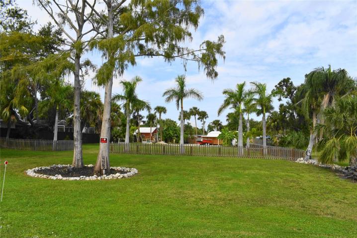 14,250 S.F. lot  - fenced with gate, included with house. 4467 North Shore Drive