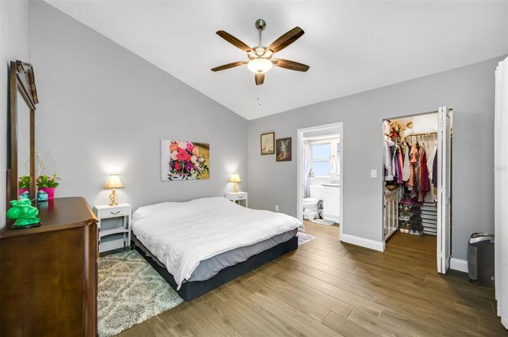 Spacious primary bedroom located in rear of home