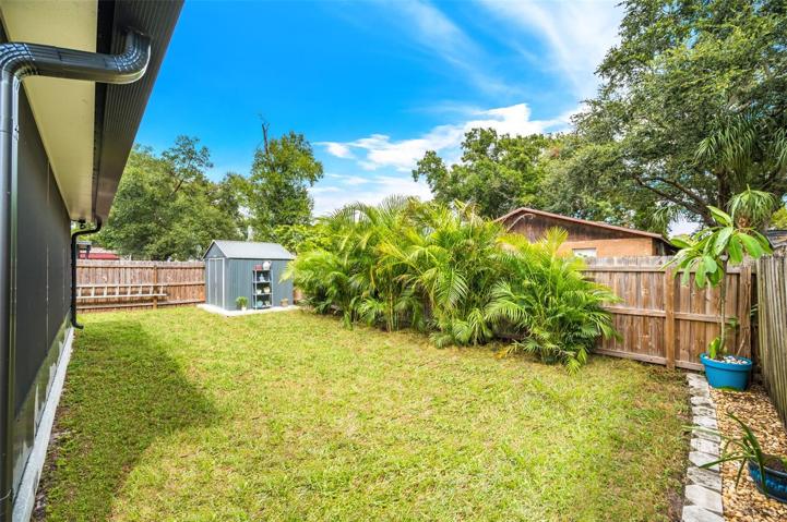 Fully-fenced tropical backyard