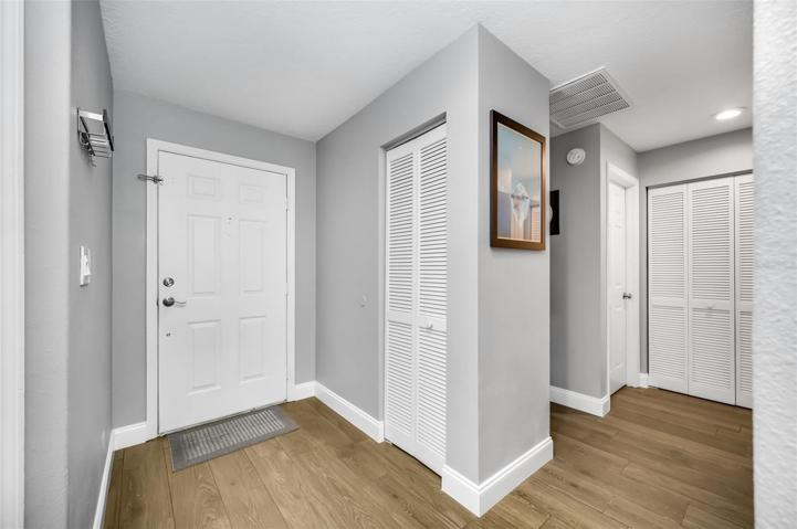 Front foyer with hall to the two secondary bedrooms
