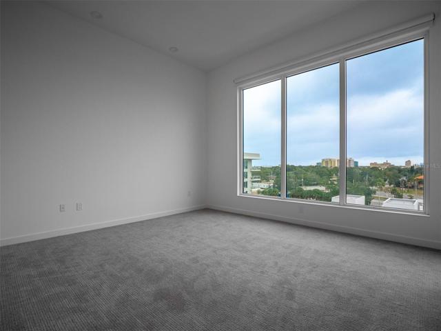Second bedroom also has beautiful views and balcony access