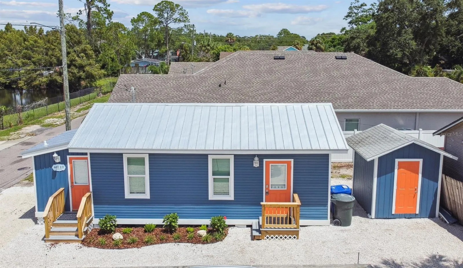2 Entrances to same unit; Left entrance enters to Laundry closet/Master Bedroom & Right Entrance open to Kitchen/Living Area