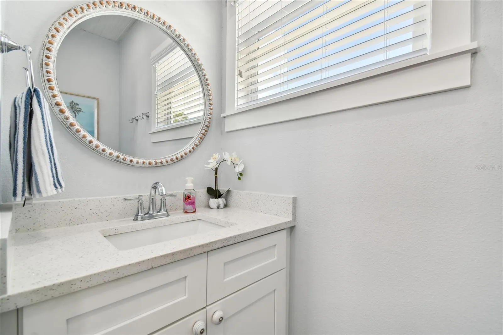 Half Bath off of Kitchen (Vanity & toilet)