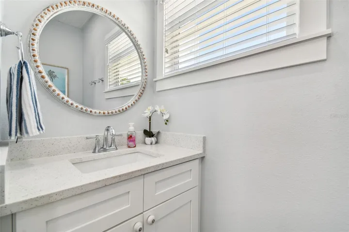 Half Bath off of Kitchen (Vanity & toilet)
