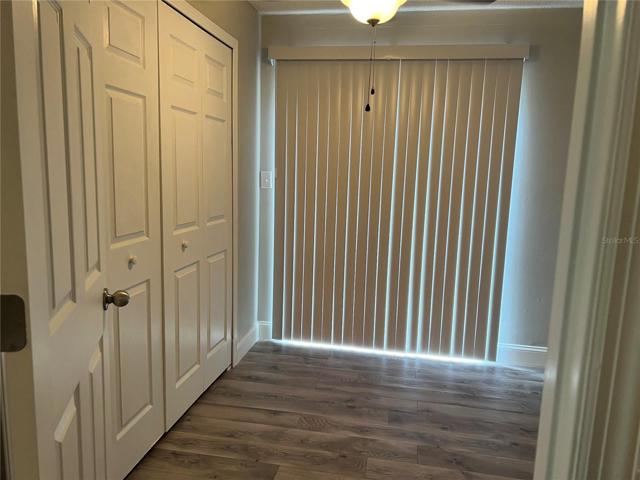 bedroom 3 with sliding door to back yard