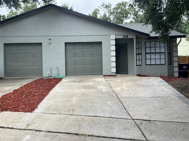 Nice half duplex with additional parking area