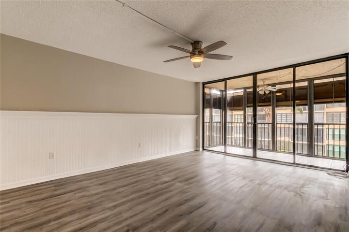 Kitchen pass thru to living room and  balcony