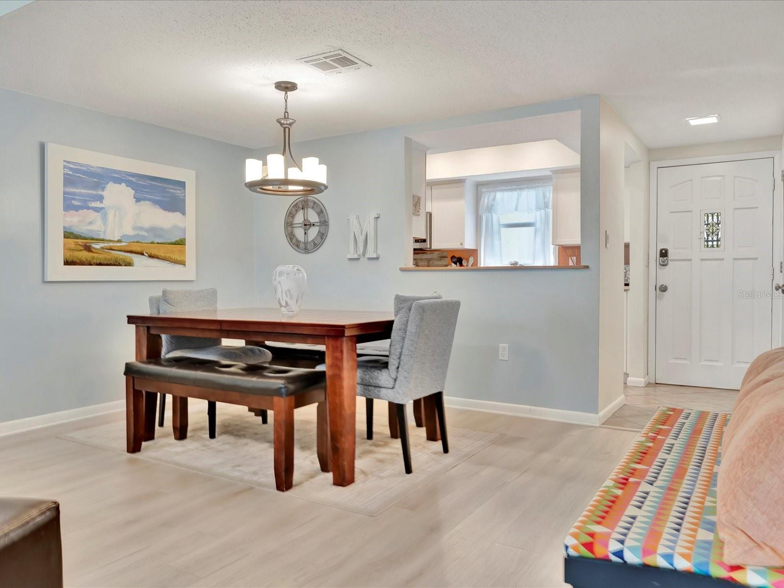 Dining Area w/view of pass-through to Kitchen