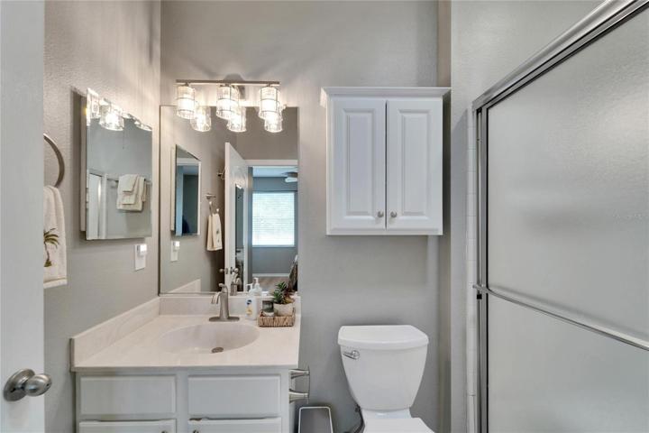 Gues Bathroom, with lovely lighting, and Shower Bath Combo