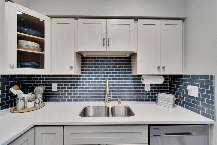 Look at that gorgeous cobolt blue backsplash. HGTV has nothing on this home.