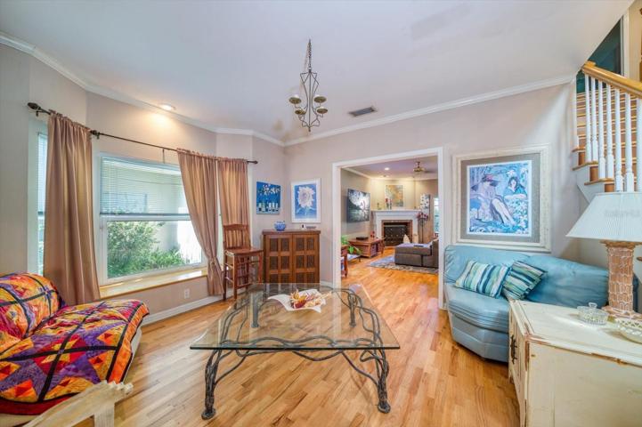 Beautiful hardwood floors enhanced by th natural light!