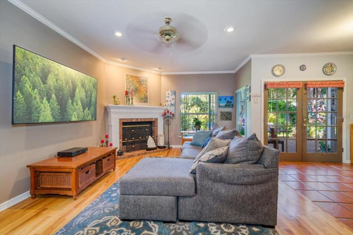 Family room including fire place and French doors leading to the backyard!