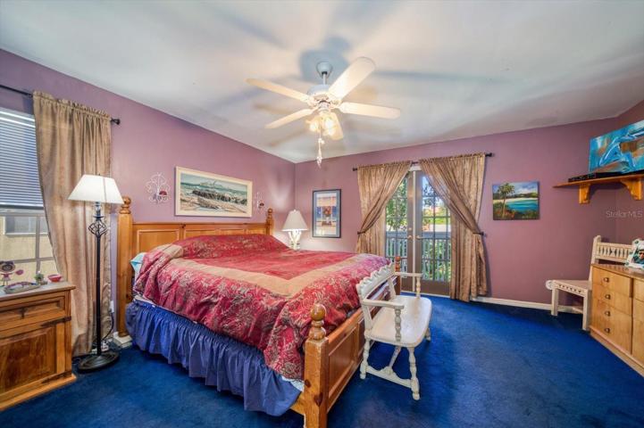 Spacious master en-suite with walk in closet and balcony overlooking the backyard!