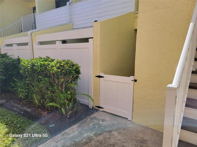 entry and fenced in courtyard