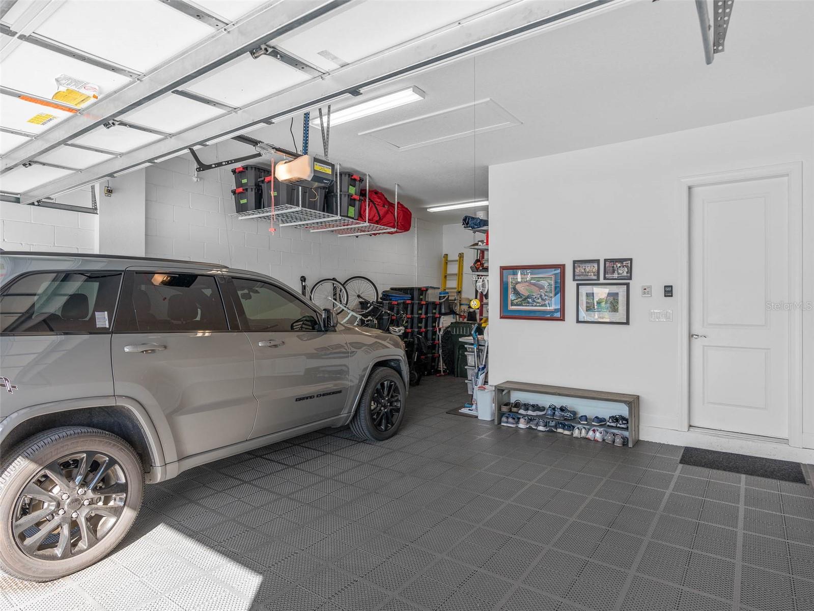 Tandem Garage with a rubberized tile floor