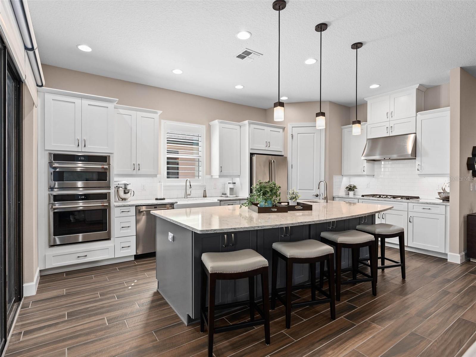 Gourmet Kitchen Upgrade with Cafe' Stainless Appliances, Island Prep Sink, Upgraded Cabinetry at the front of the Island for that extra storage