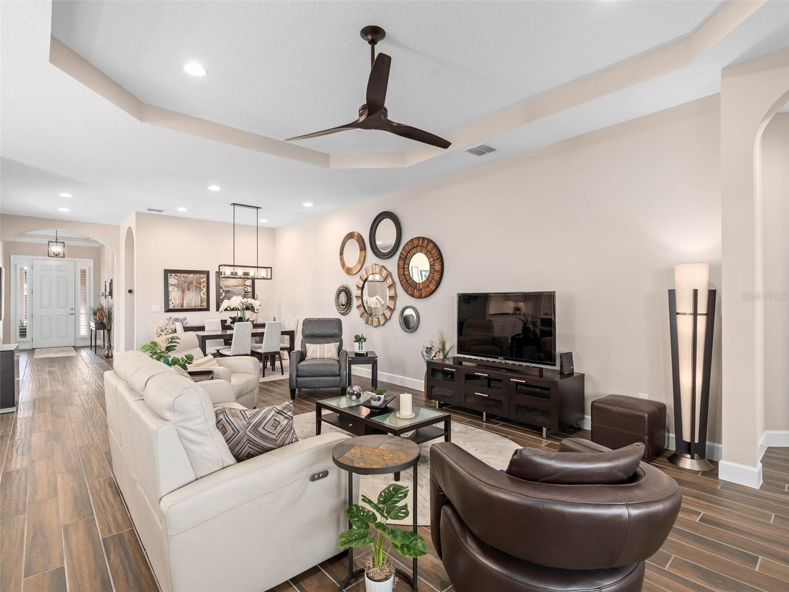 Great Room with a view of the Dining Area and Foyer