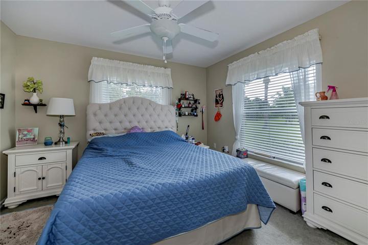 one of three auxiliary bedrooms