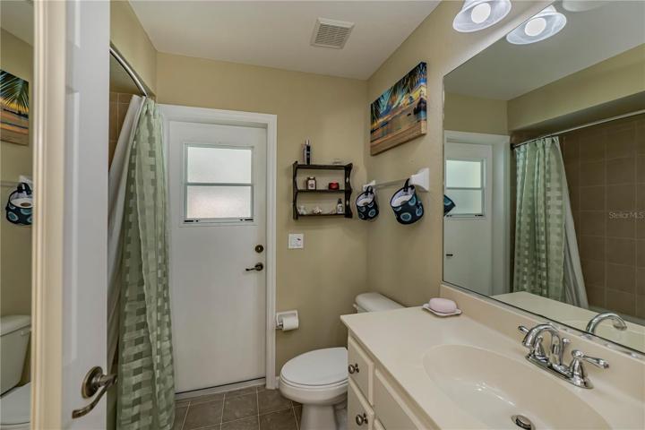 guest bath opens to the pool