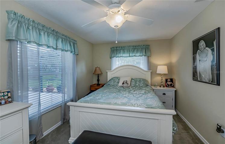 one of three auxiliary bedrooms