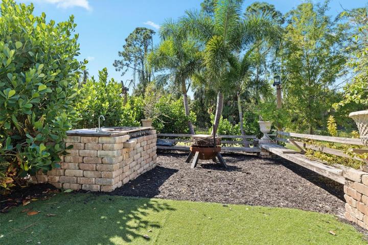 Outside grill and seating/ back yard
