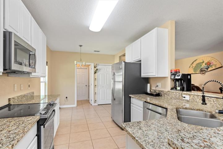 Kitchen looking into dining nook