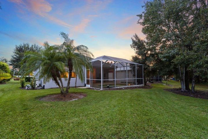 Back yard featuring a new invisible fence, and preserve view!