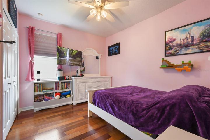 Supporting bedroom connected to Jack and Jill bathroom, generous in size with a double closet.